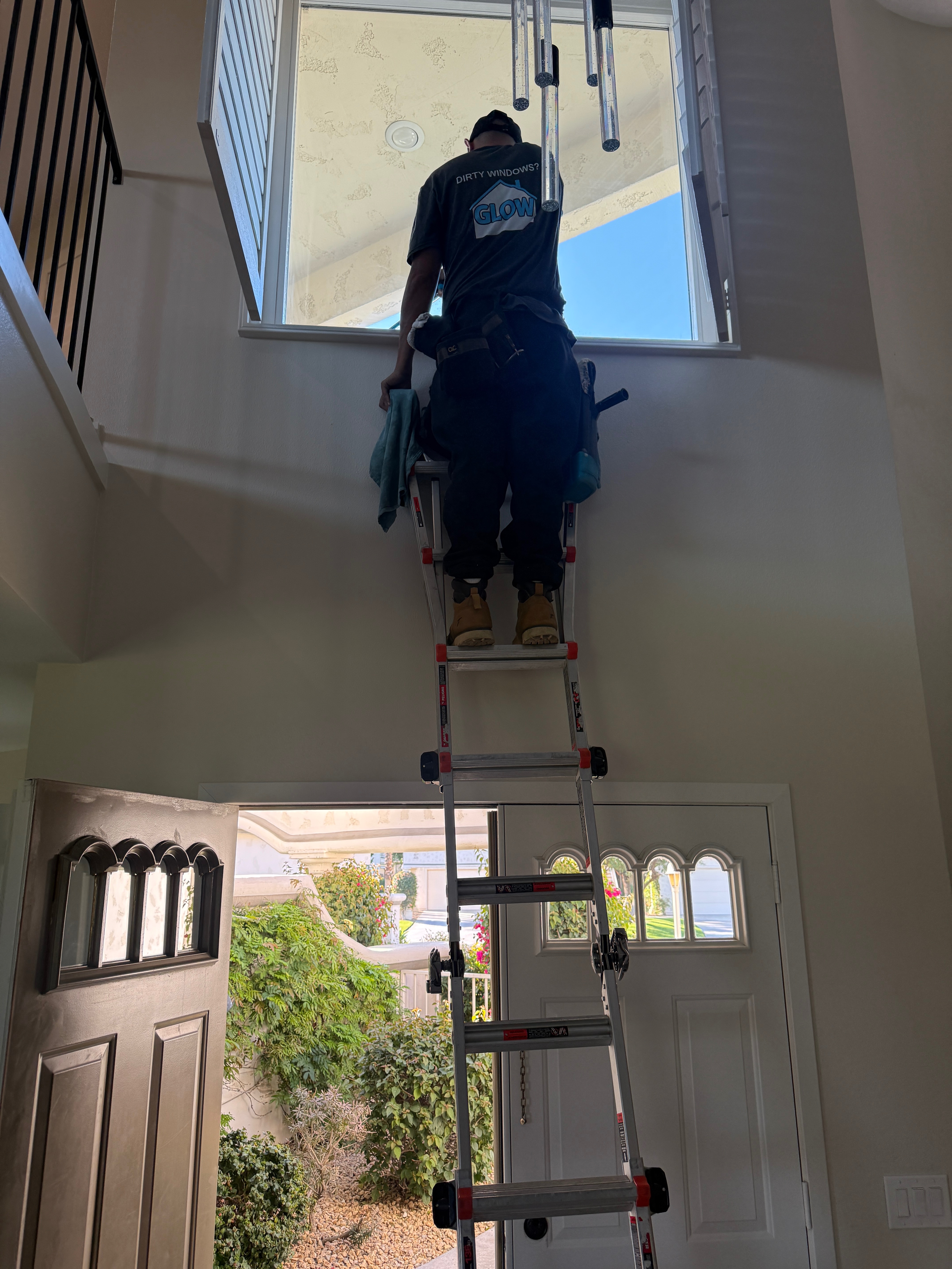 High entryway window cleaning at a Rancho Mirage residence