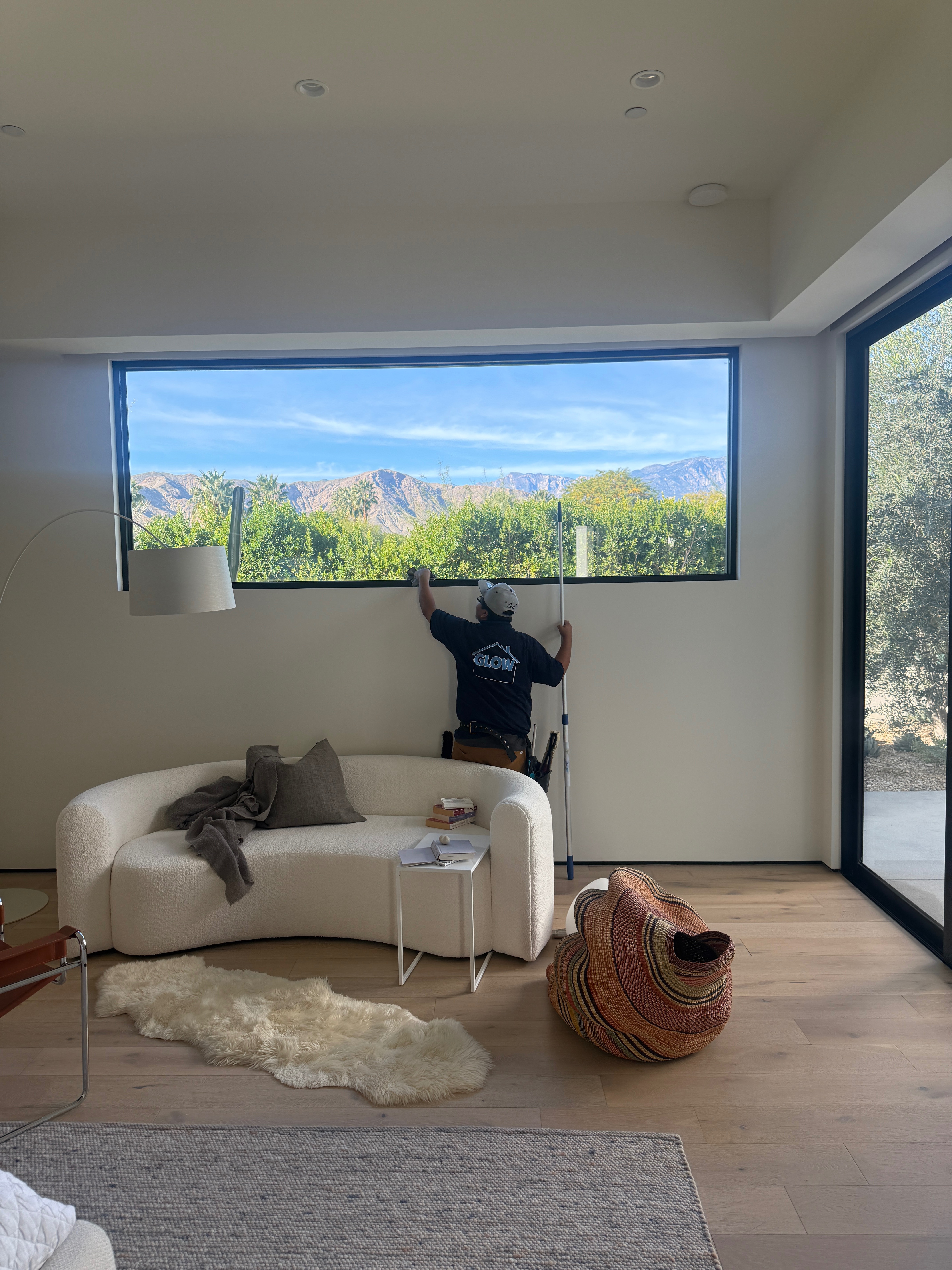 Interior window cleaning in a luxury Palm Springs living room